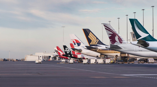 Photo of Plane tail wings parked at Adelaide Airport
