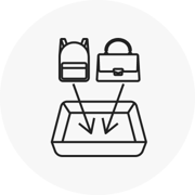 Icon of bags going in a security tray