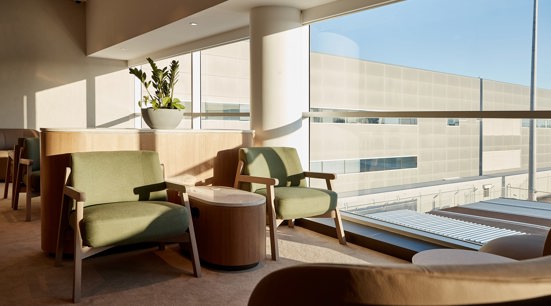 lounge chair at window inside qantas adelaide airport lounge