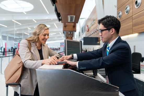 Person checking in at Adelaide Airport
