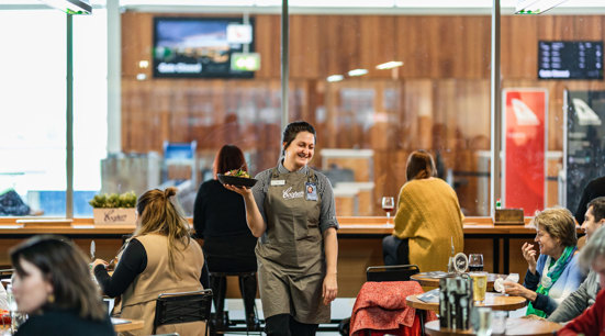Adelaide Airport staff serving drinks