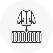 Image of a coat being put on security roller for scanning