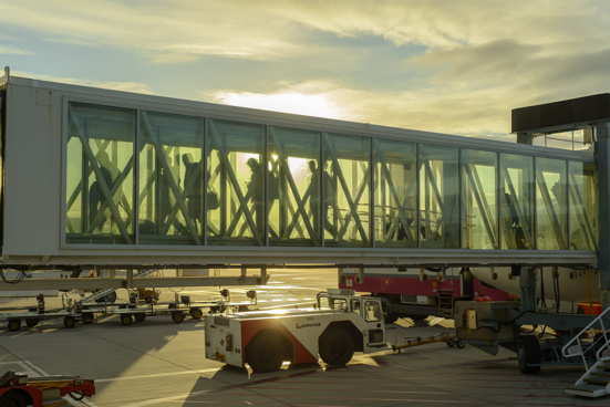 Passengers use the air bridge at Adelaide Airport