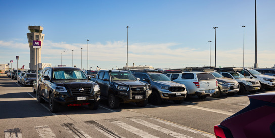 A family walking through the P3 carpark at Adelaide Airport